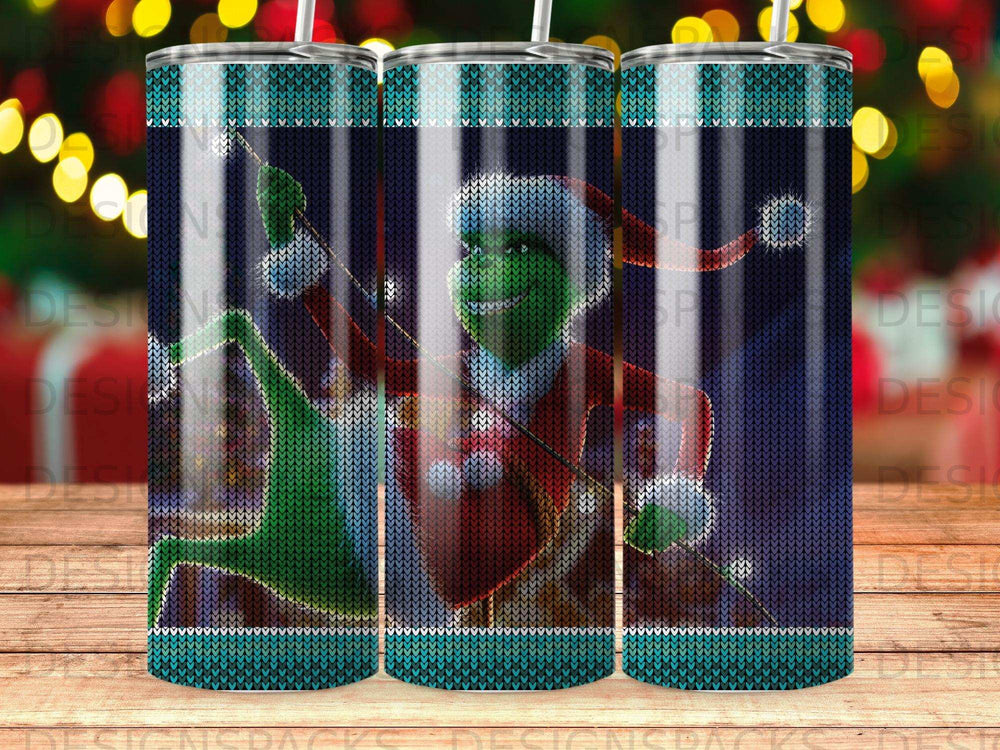 The Grinch wearing a Santa hat and jacket on a knitted background.
