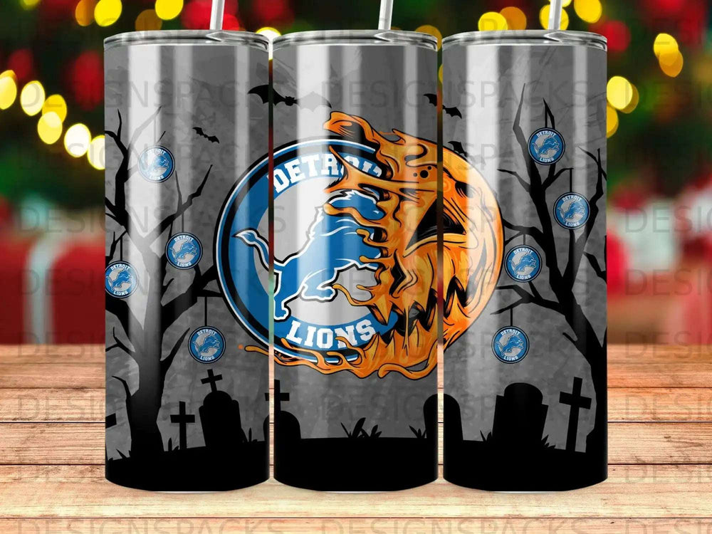 Detroit Lions logo on a Halloween-themed tumbler with trees and tombstones.