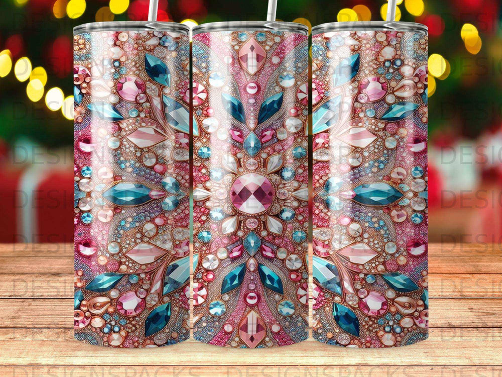 Pink and blue gem-encrusted tumbler with repeating ornate floral pattern.