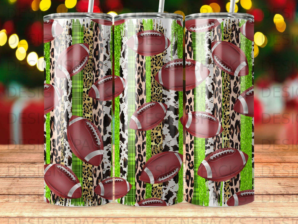 Tumbler with footballs and leopard print with green and black stripes.