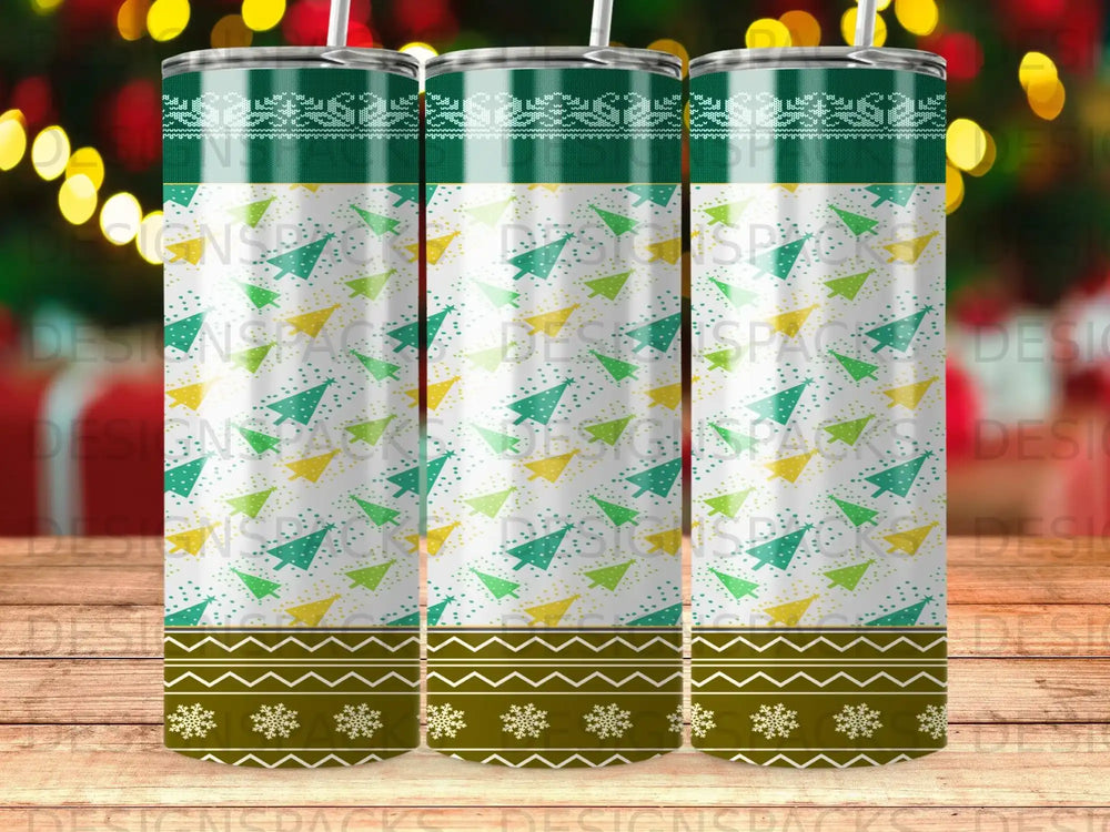 Green and white Christmas tree pattern tumbler with decorative borders.