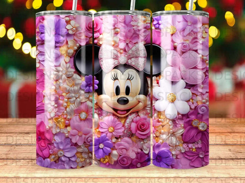 Minnie Mouse surrounded by a vibrant floral and pearl embellishment on a tumbler.