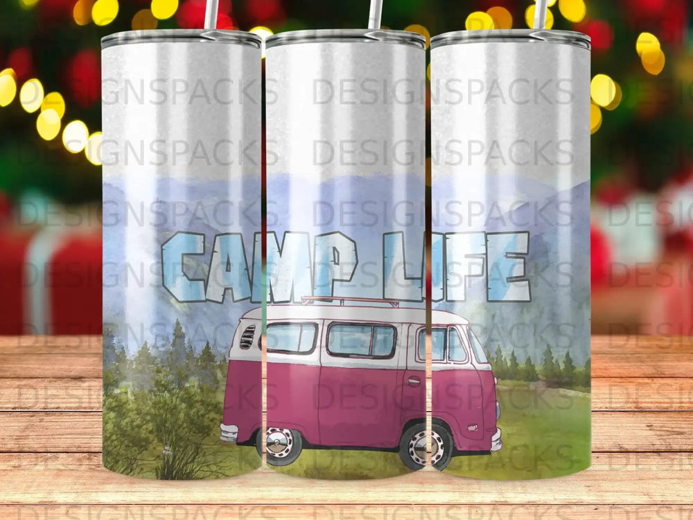 Pink camper van with "CAMP LIFE" text, set against a mountain and trees.