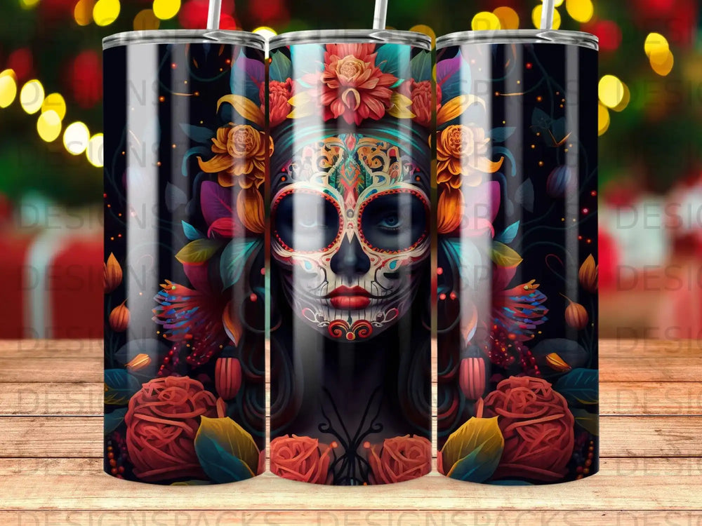 Day of the Dead skull design with flowers and vibrant colors on a tumbler.