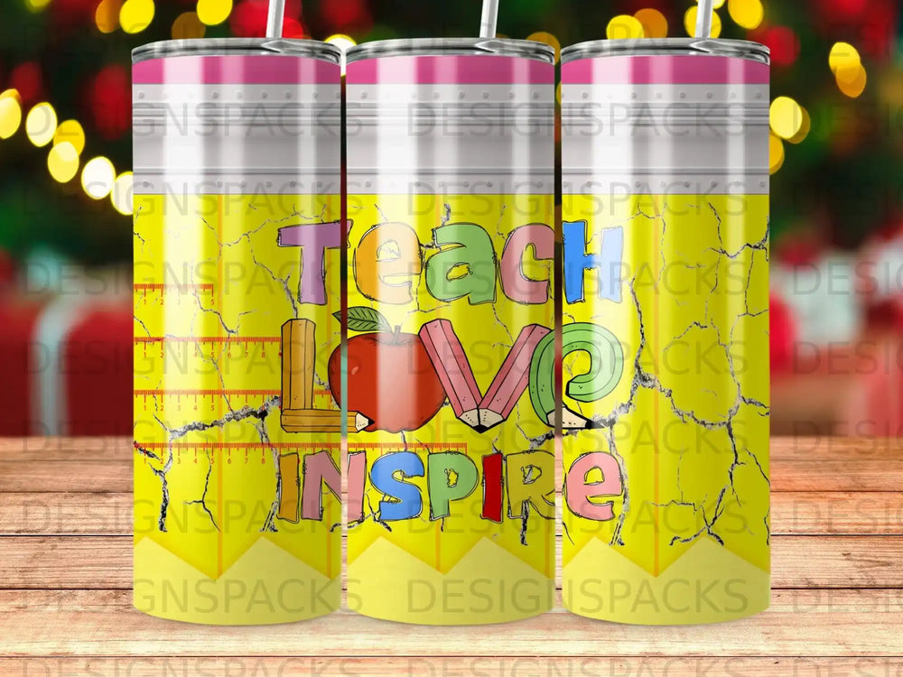 Tumbler with "Teach Love Inspire" text and apple design on yellow background.