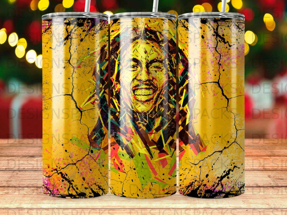 Bob Marley abstract art tumbler with yellow and red splashes.