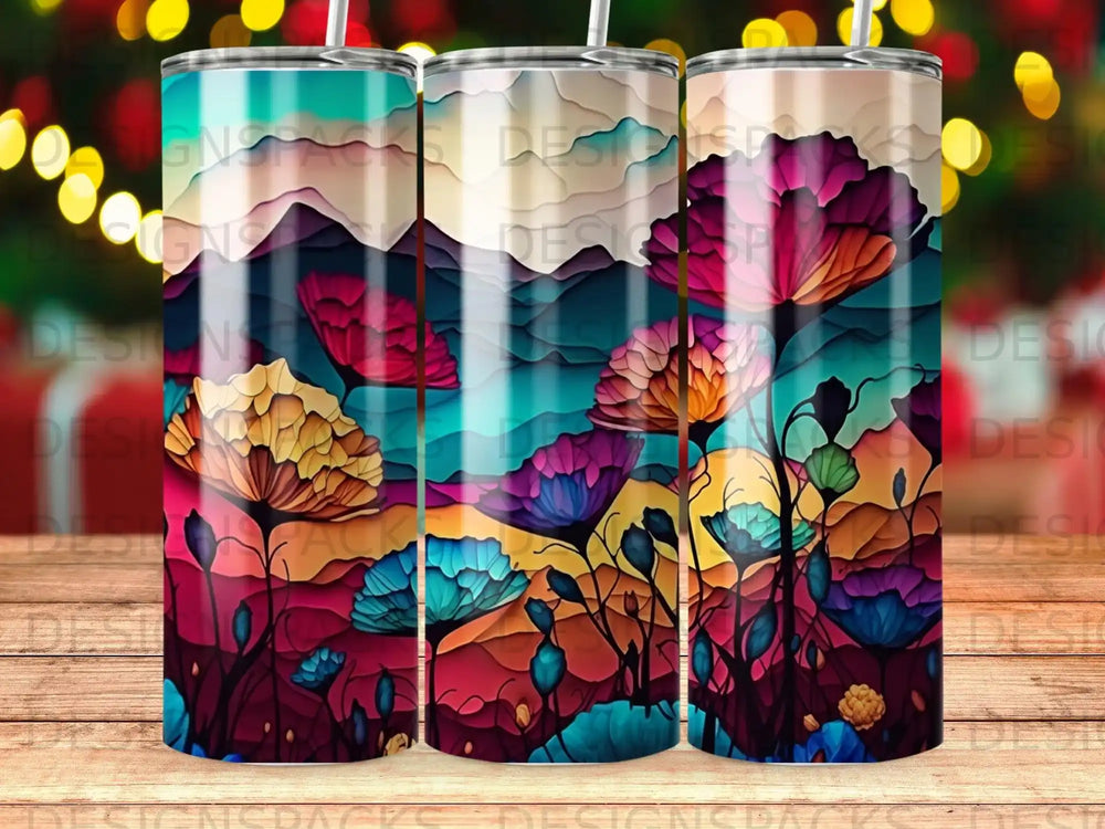 Floral mountain landscape with vibrant colors on a tumbler.