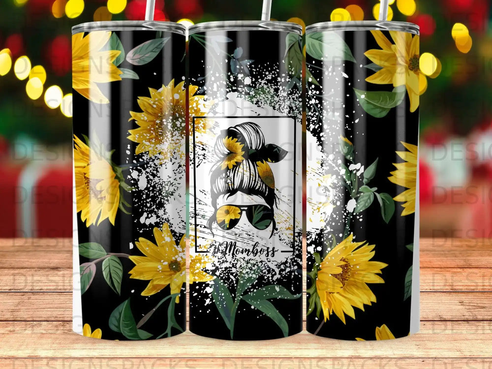 Sunflower and splash design with "MomBoss" text on a black tumbler.