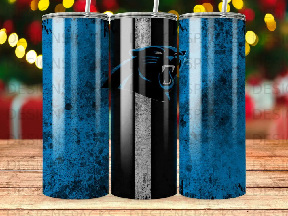 Carolina Panthers logo on a distressed blue and black tumbler with bokeh background.