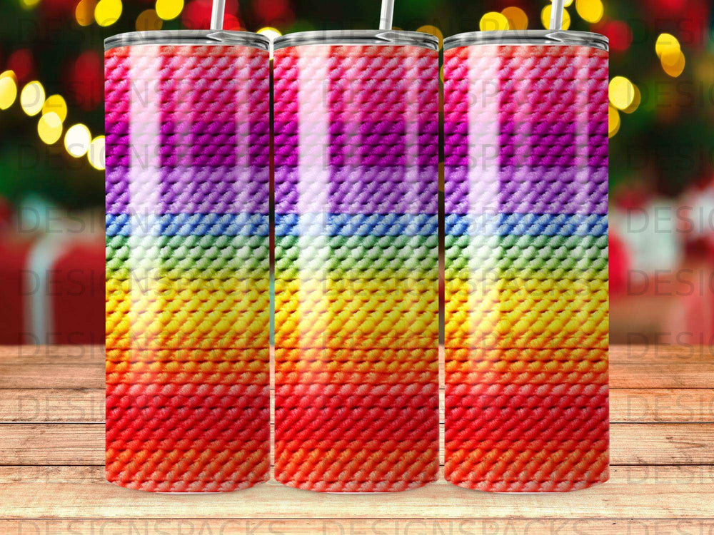 Tumbler with rainbow knit pattern.