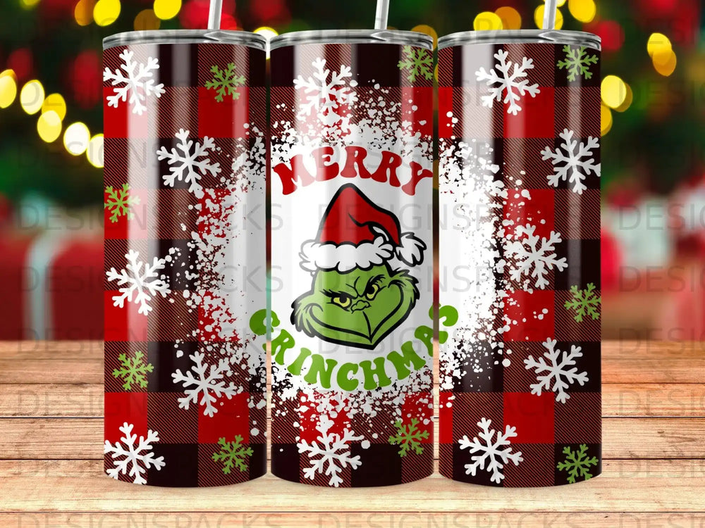 The Grinch with "Merry Grinchmas" text and snowflakes on a plaid background.