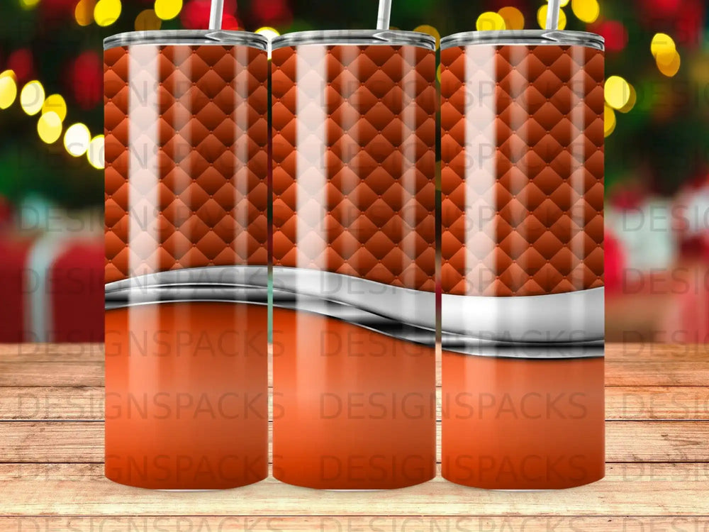 Orange quilted tumbler with silver stripe and bokeh background.