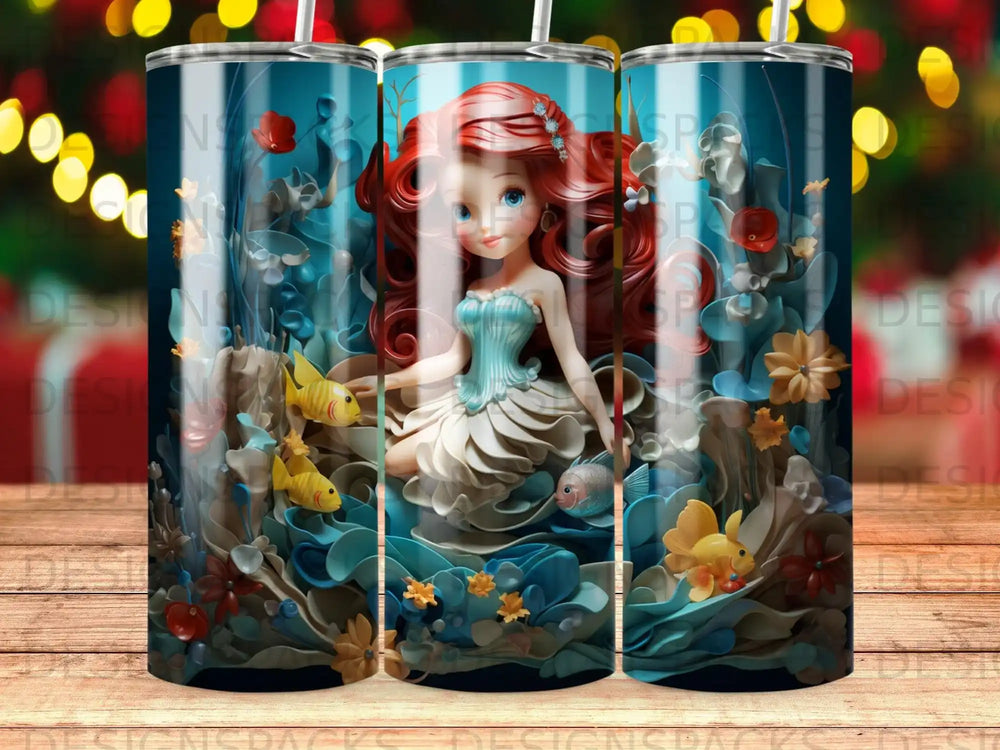 Ariel with fish and flowers on a blue tumbler.