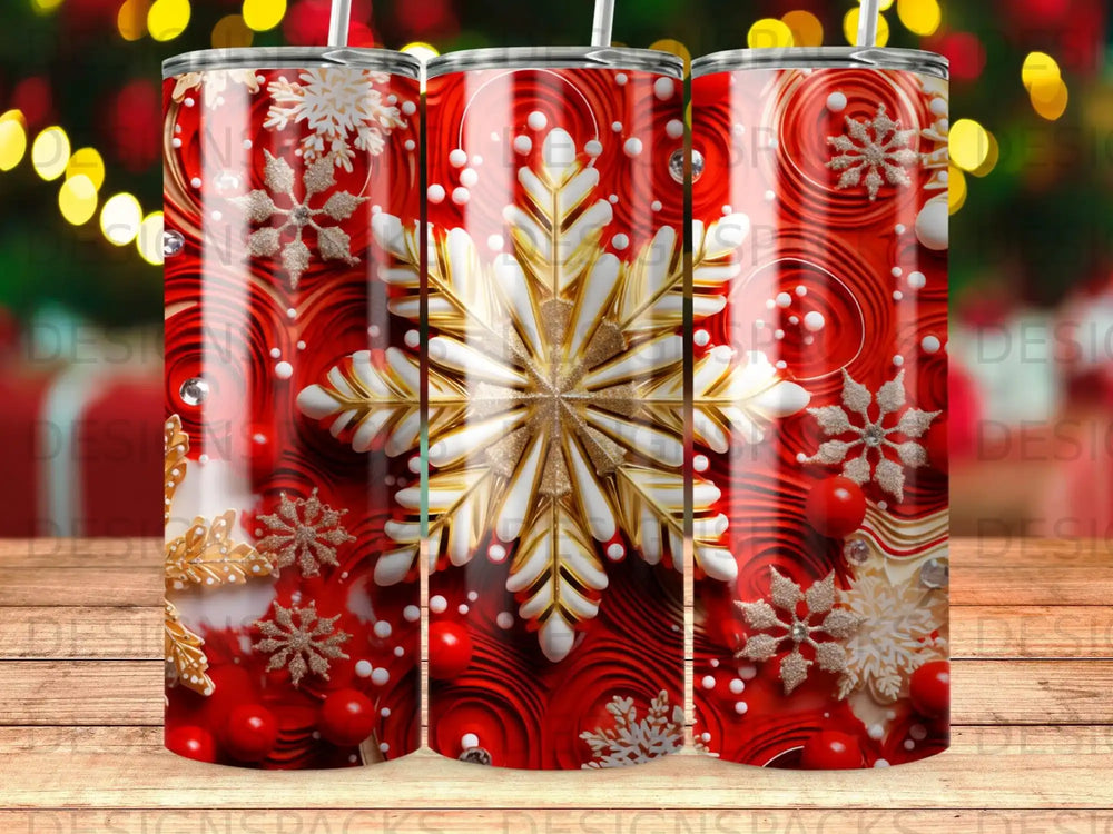 Red tumbler with large white and gold snowflake and festive circular patterns.
