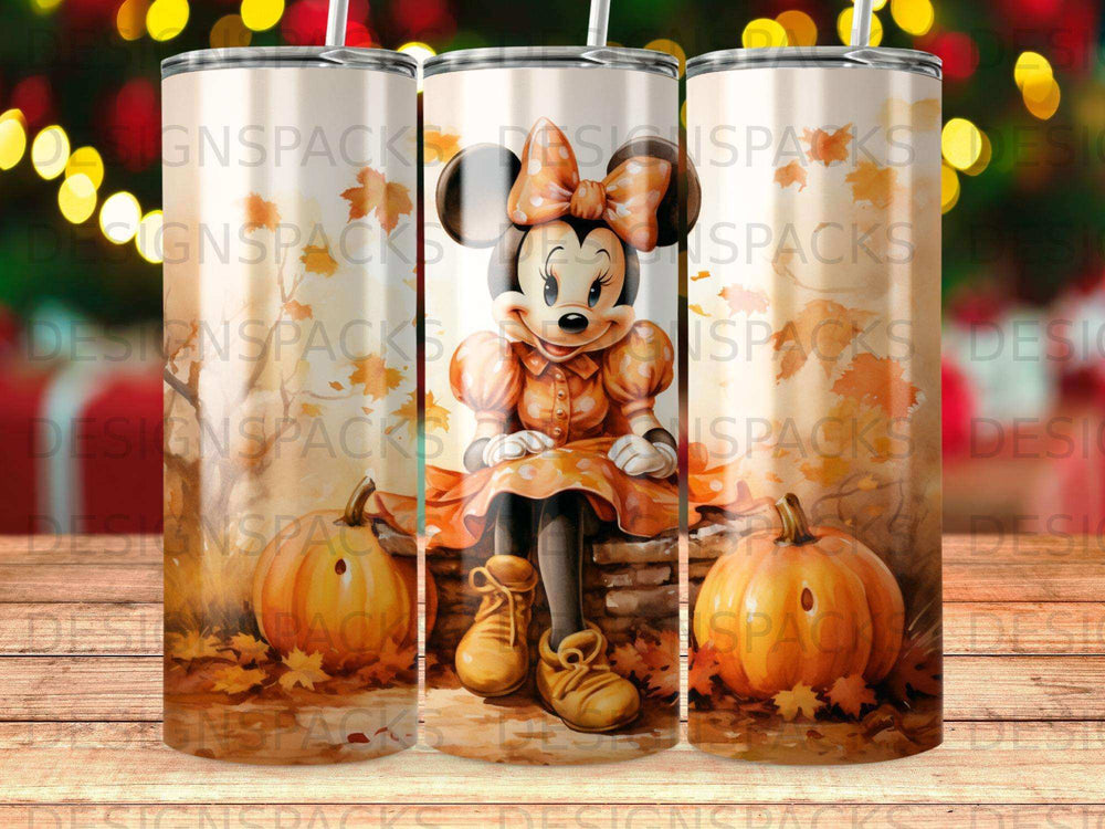 Minnie Mouse in orange dress sitting with pumpkins, autumnal theme.