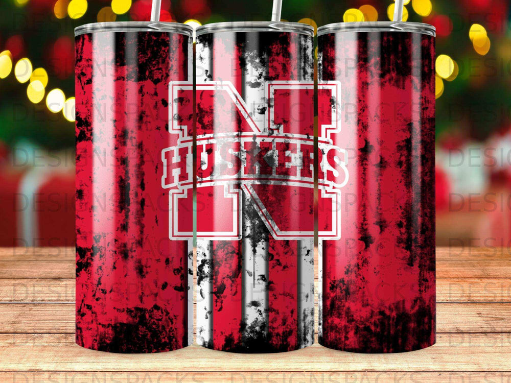 Nebraska Huskers distressed grunge tumbler with red, white, and black stripes.