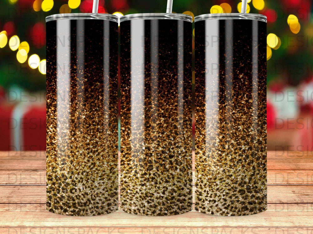 Three tumblers with a glittery, leopard-print-like design and black lids.