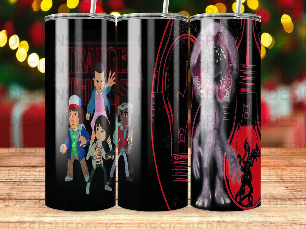 Stranger Things characters and Demogorgon on black tumbler wrap.