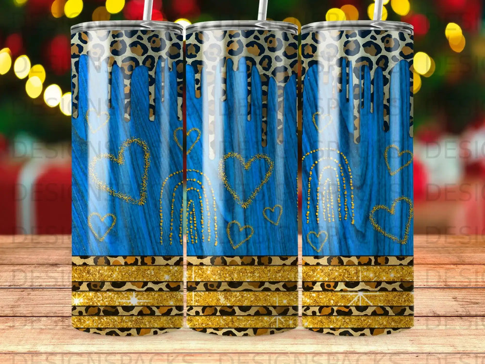 Blue tumbler with leopard print, gold glitter, and hearts.