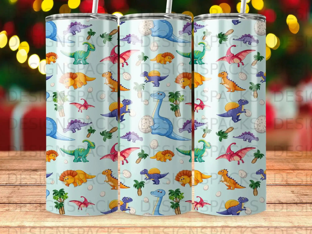 Blue tumbler with colorful dinosaur pattern and palm trees.