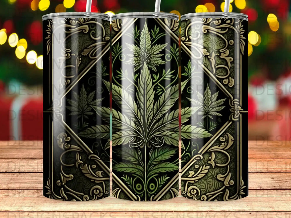 Tumbler with ornate cannabis leaf design and dark gold decorative border.