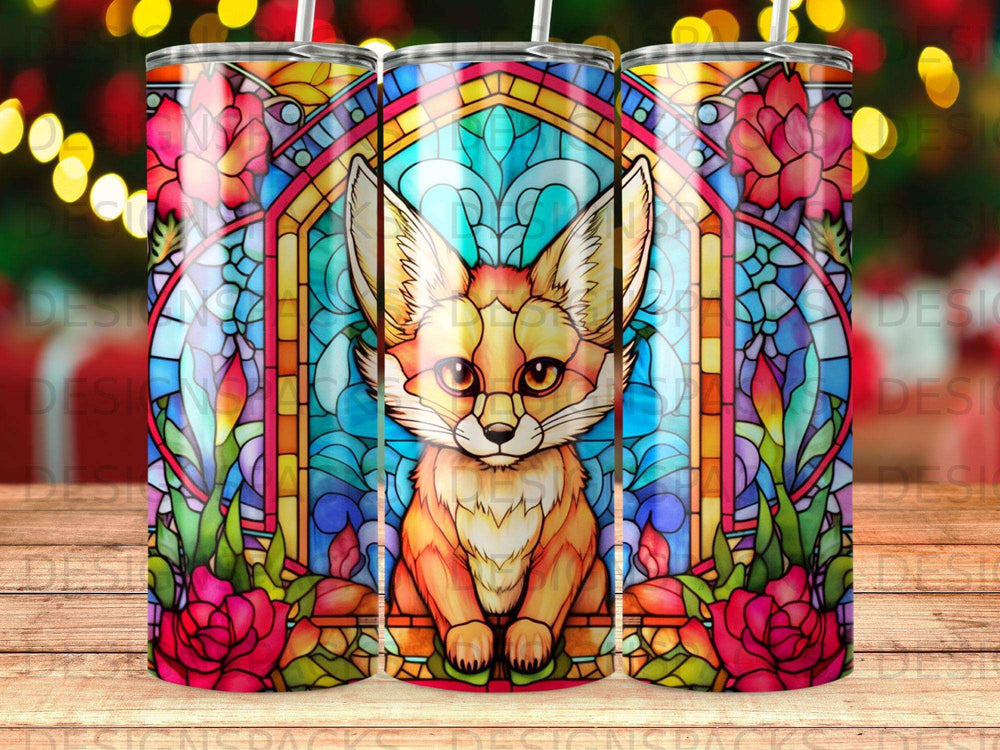 Stained glass fox with floral border on a tumbler.