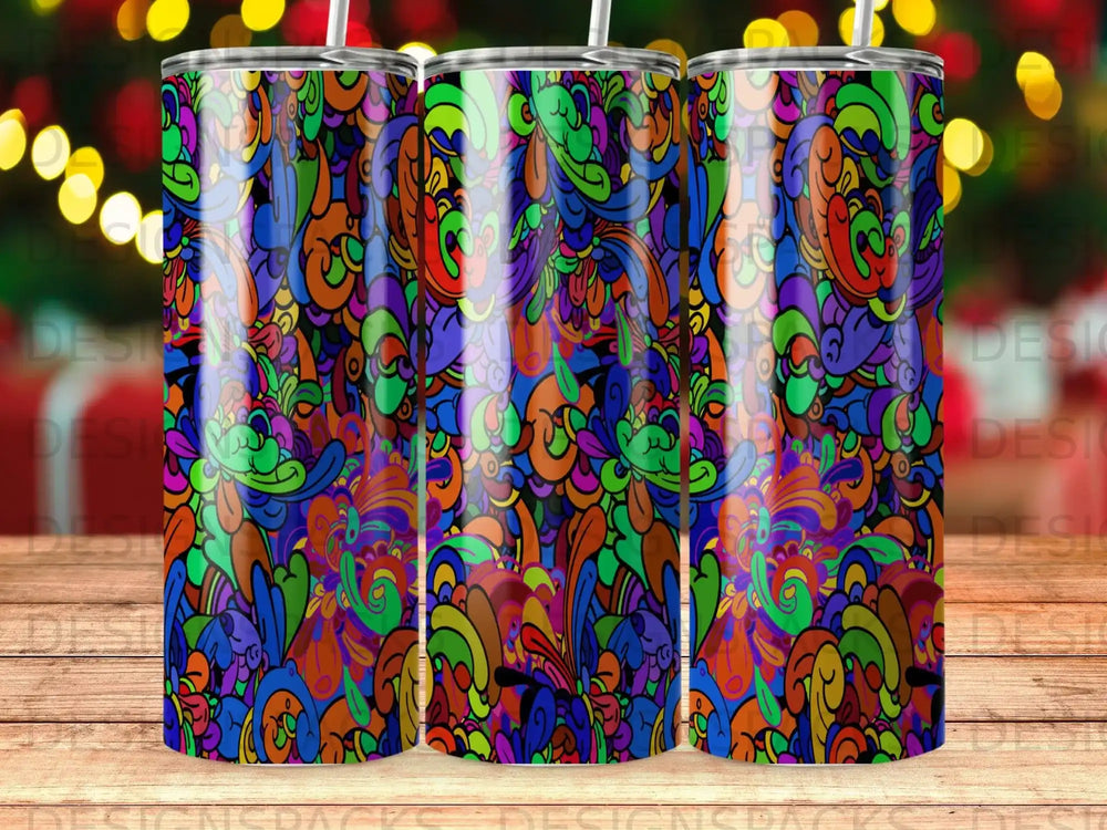 Colorful abstract paisley pattern on three tumblers with bokeh lights background.