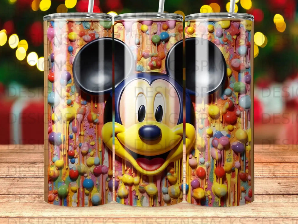 Mickey Mouse face with colorful dripping paint blobs on a tumbler.