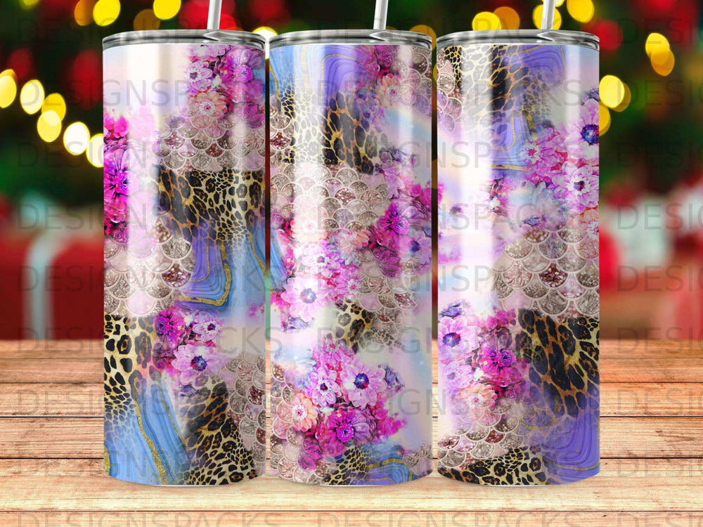 Floral and leopard print tumbler with gold accents.