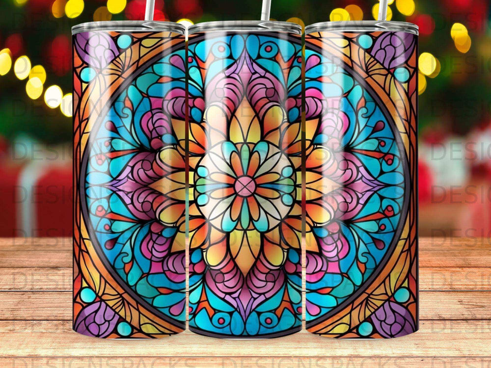 Colorful mandala pattern on a stainless steel tumbler with bokeh lights background.