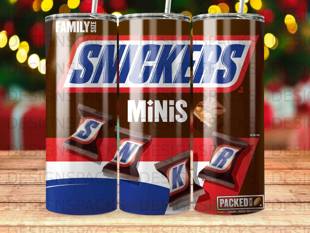 Snickers Minis candy bar packaging on a brown tumbler with holiday lights.