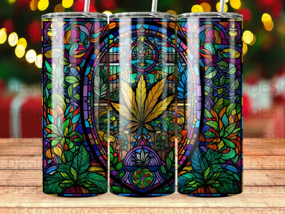 Stained glass tumbler with cannabis leaf design.