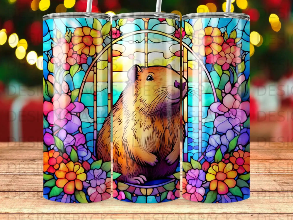 Stained glass art featuring a hamster within a floral frame.