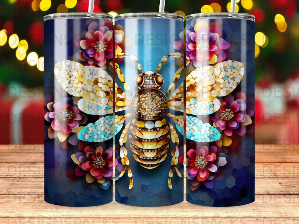 Bee and floral pattern on a blue tumbler.
