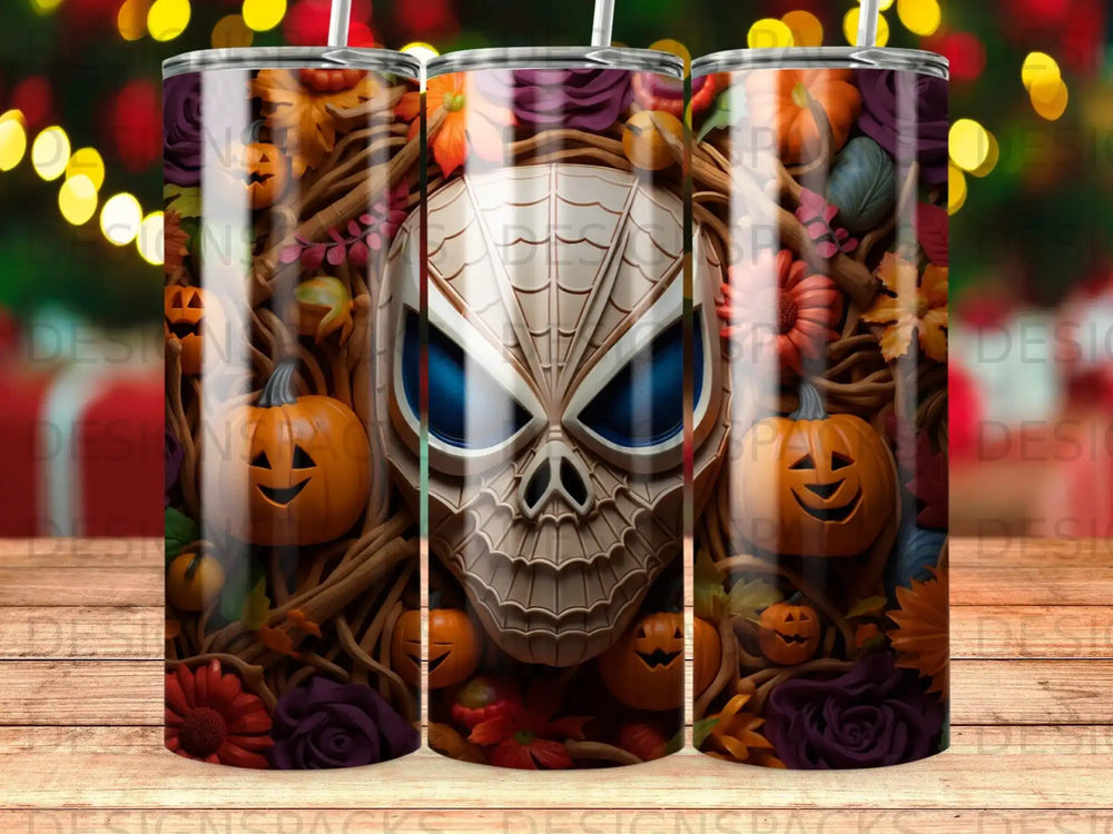 Halloween themed tumbler with a skull and pumpkins, set against a dark background.