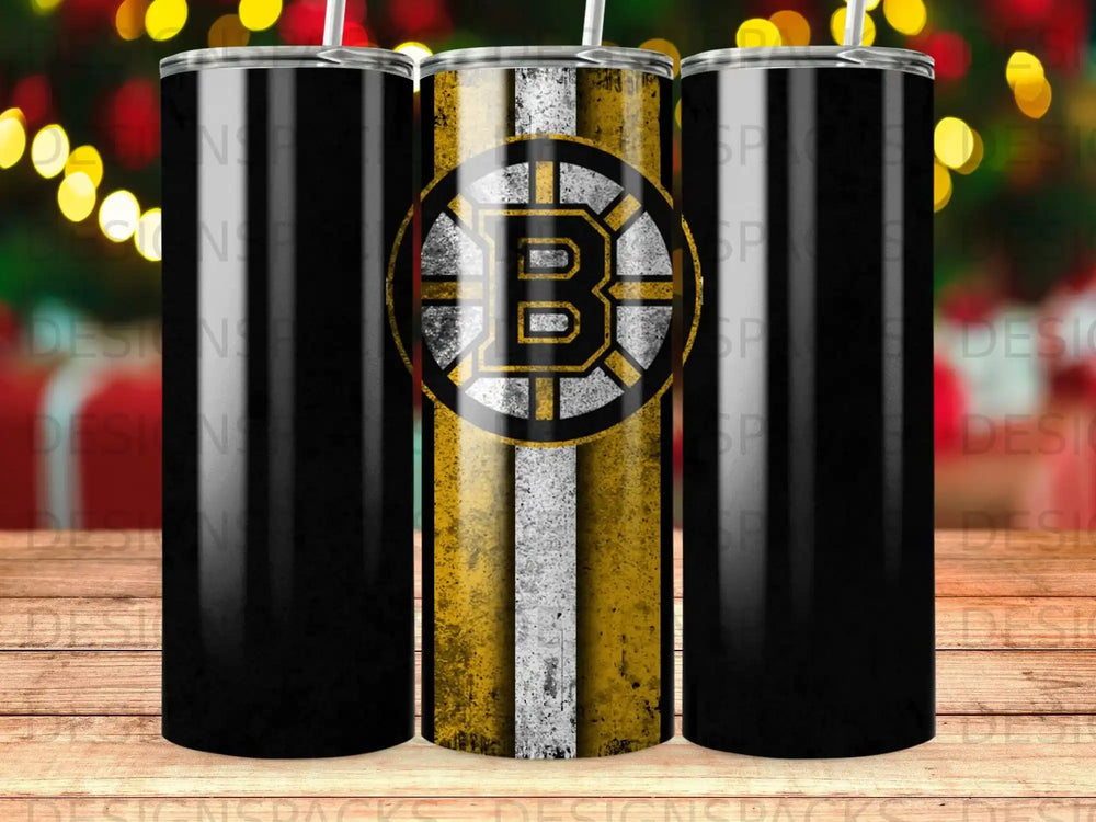 Boston Bruins logo on a distressed yellow and black striped tumbler.