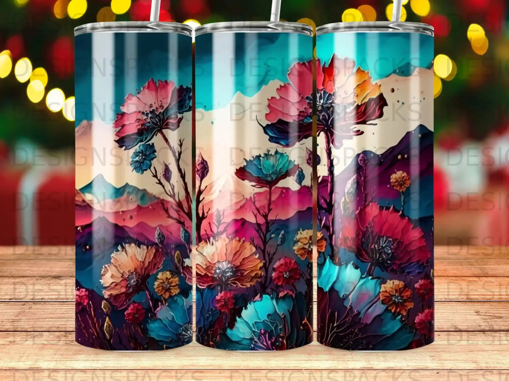 Tumbler with floral mountain landscape art.