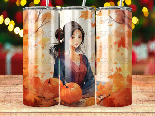 Woman in a kimono holding pumpkins with autumn leaves.