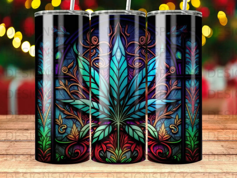 Stained glass tumbler with cannabis leaf and floral accents.