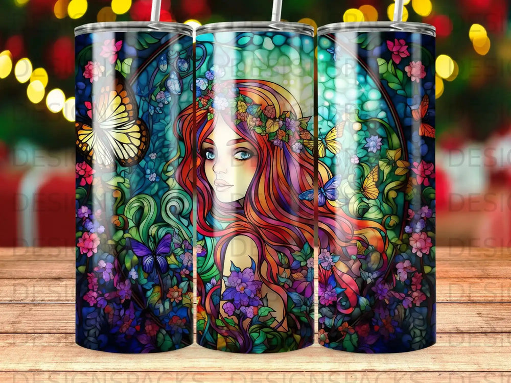 Woman with long red hair and floral headdress surrounded by butterflies and flowers.