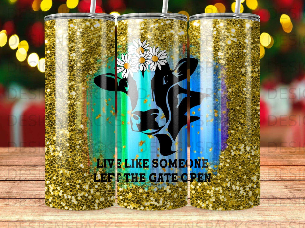 Cow head with flowers and glitter, reads "LIVE LIKE SOMEONE LEFT THE GATE OPEN".