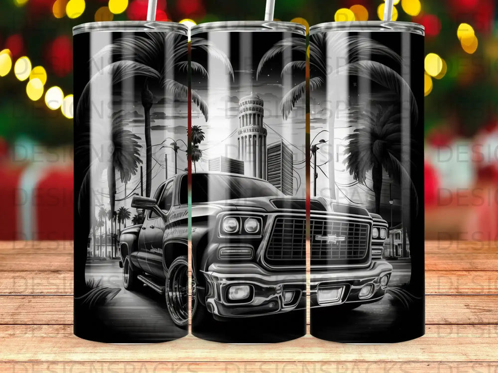 Black and white pickup truck with palm trees and city skyline.