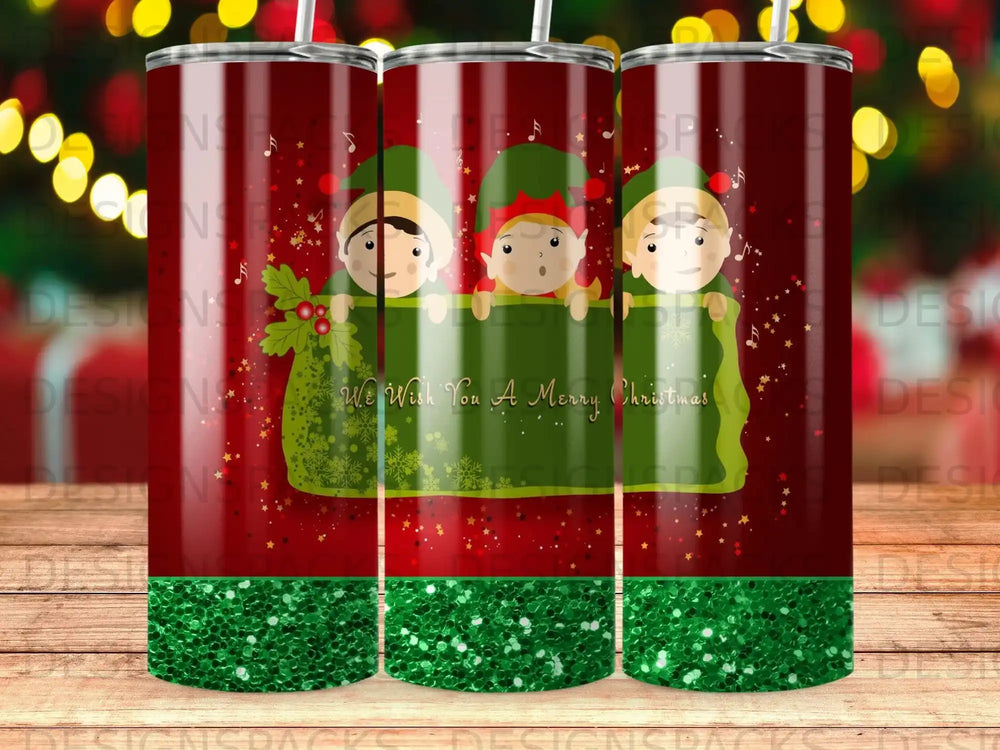 Christmas tumblers with elves holding a "We Wish You A Merry Christmas" banner.