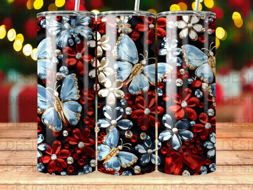Black tumbler with blue butterflies, red and white flowers, and rhinestones.