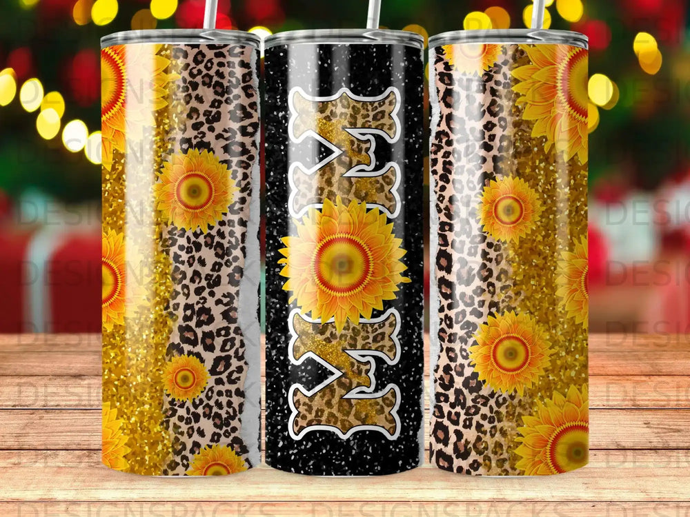 Three tumblers with leopard print, sunflowers, and glitter.