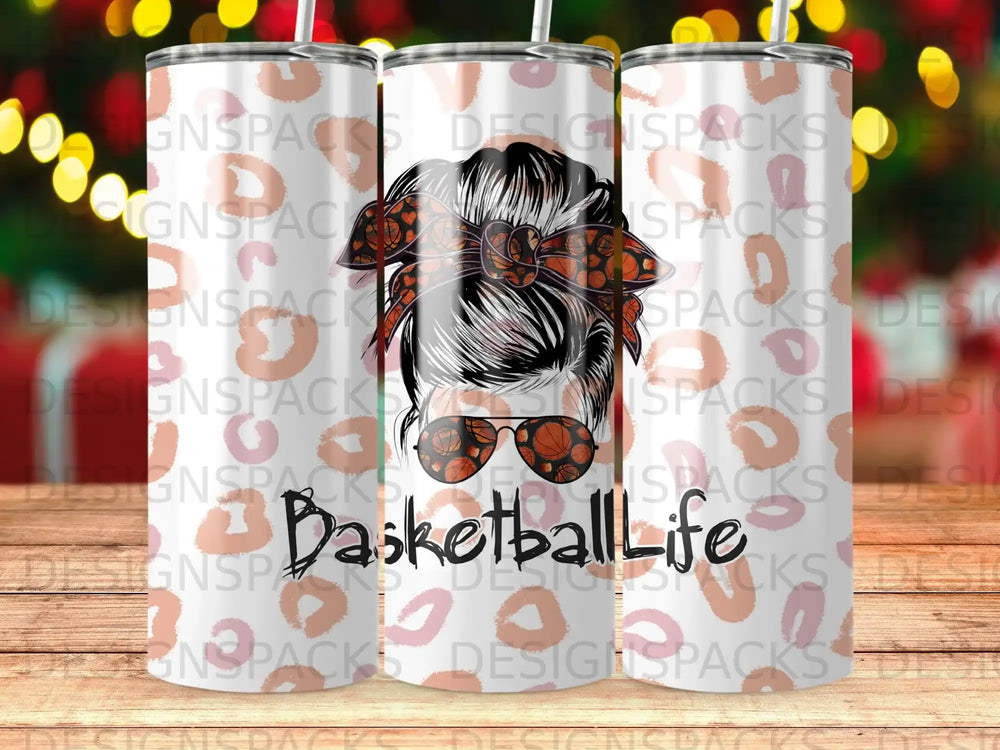 Tumbler with messy bun hairstyle graphic and "Basketball Life" text.