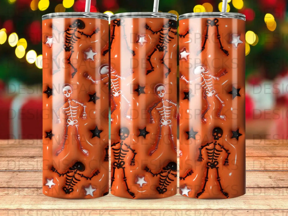 Orange tumbler with dancing skeleton pattern and white stars.