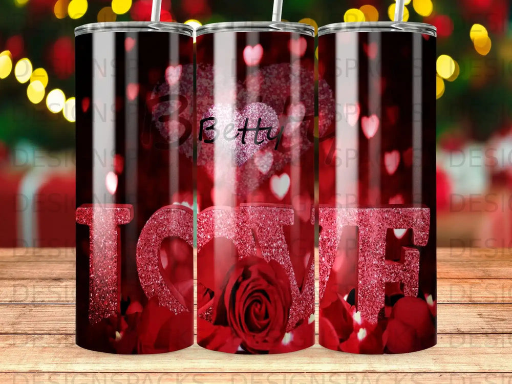 Red tumbler with "Love" in glitter and "Betty" in script, surrounded by roses.