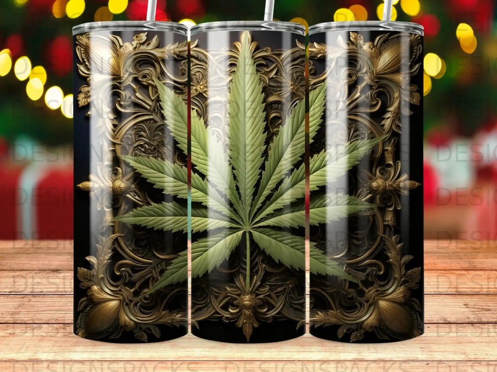 Cannabis leaf design on a black and gold ornate tumbler.