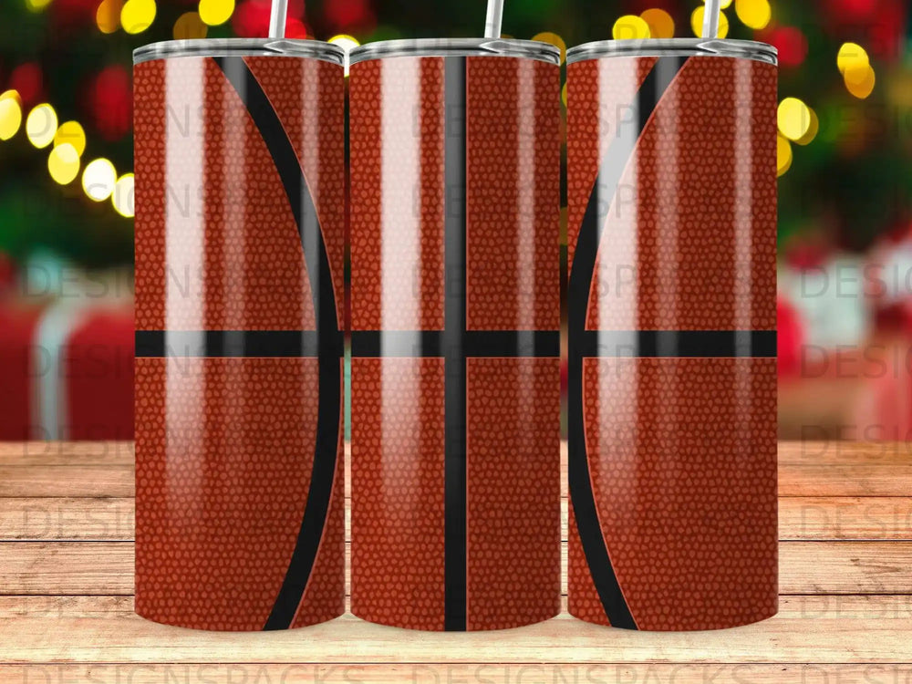Basketball pattern tumbler with black lines on textured orange background.